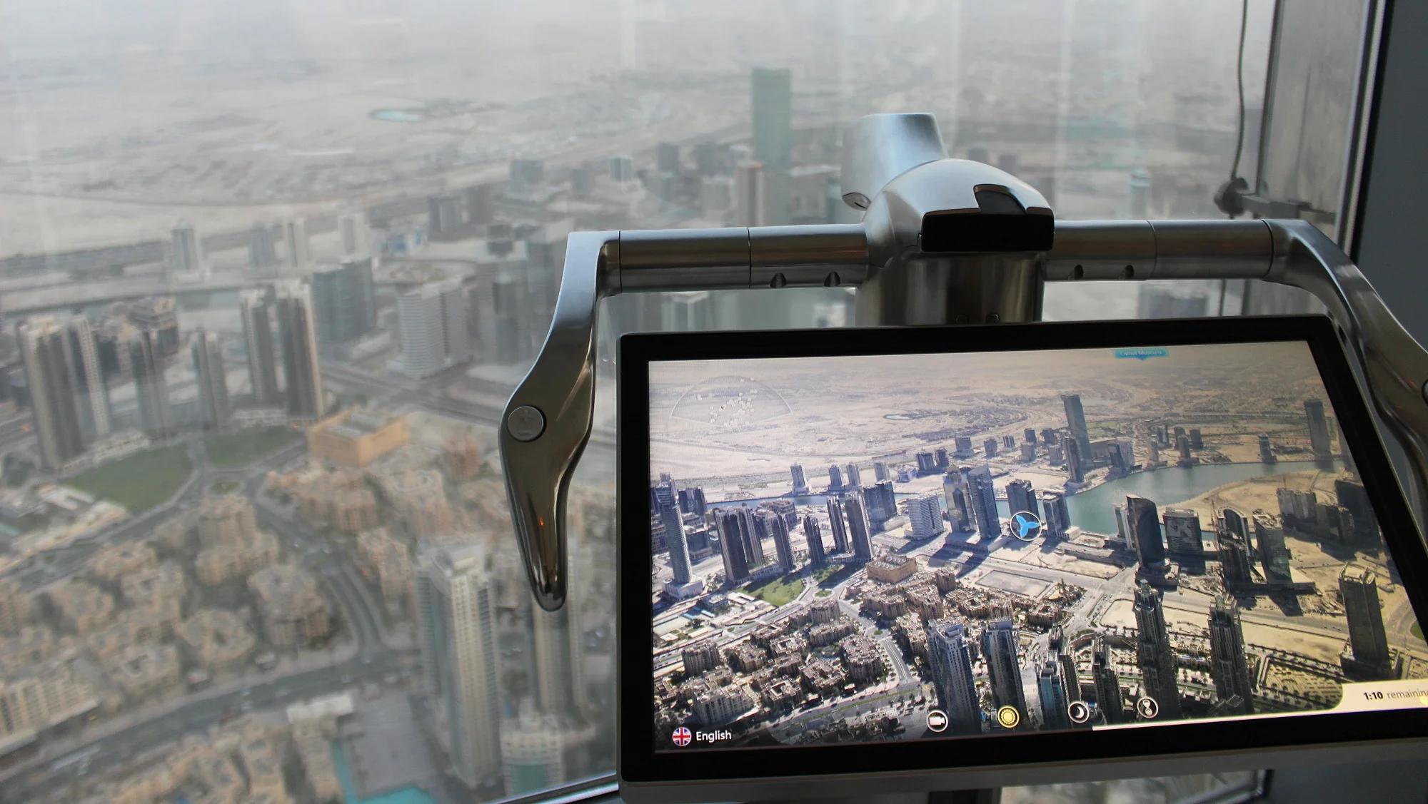 Burj Khalifa VR screen or digital binoculars showing Dubai on a clear day.