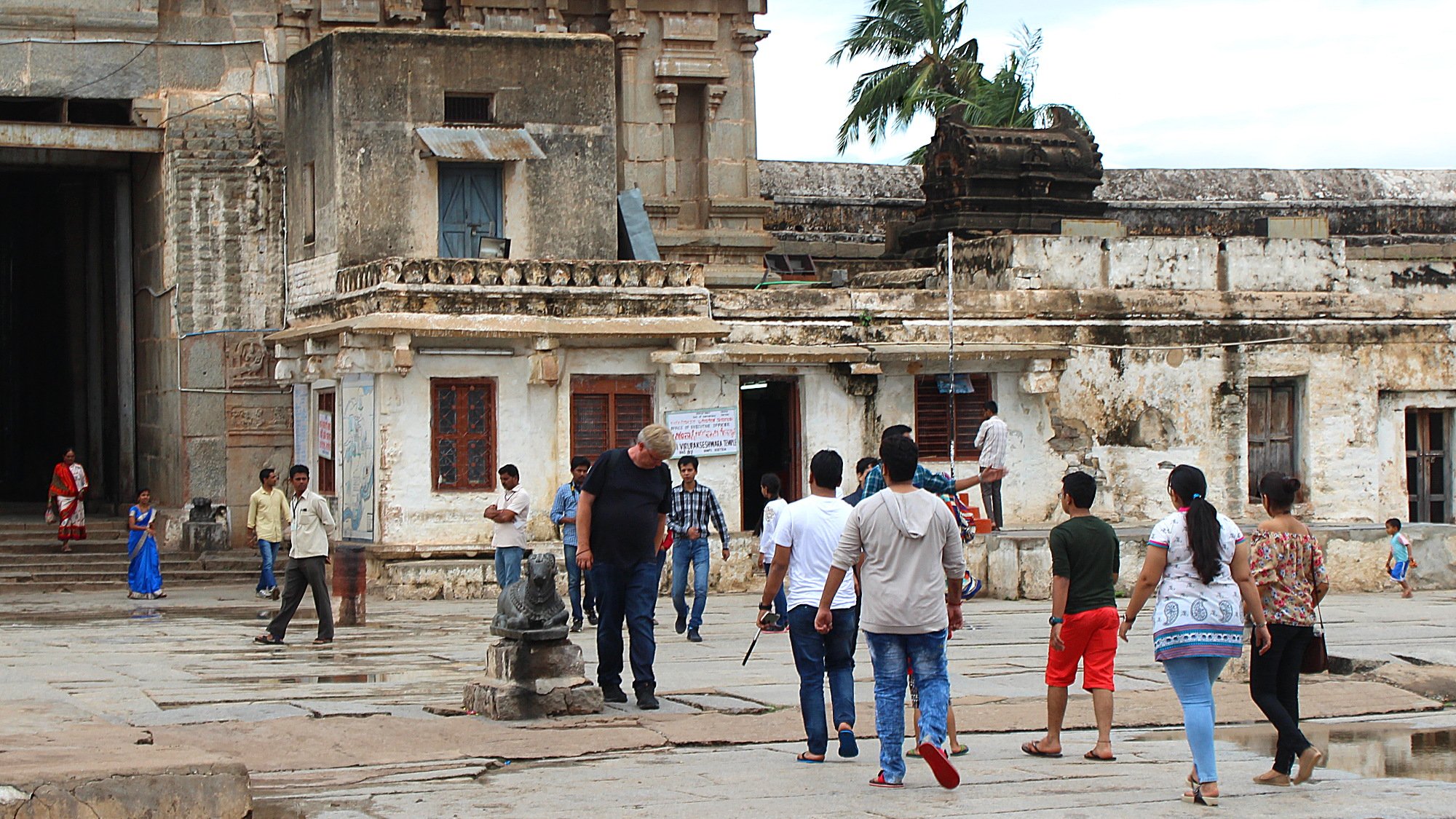 Tourists in the yard of the Virupaksha Temple.