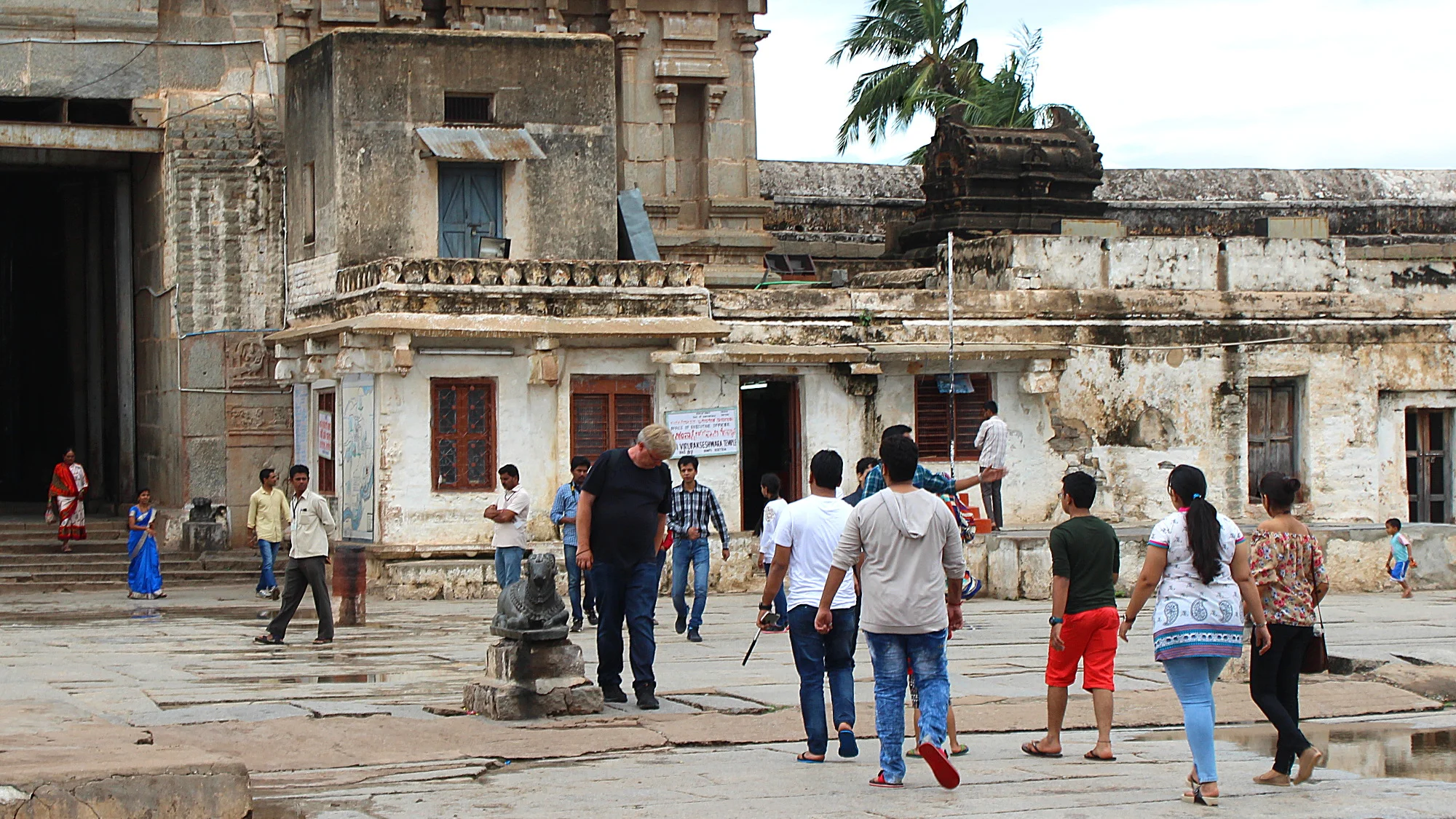 Tourists in the yard of the Virupaksha Temple.