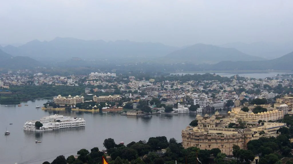 Udaipur and Lake Pichola photographed from lookout hill on a cloudy day.