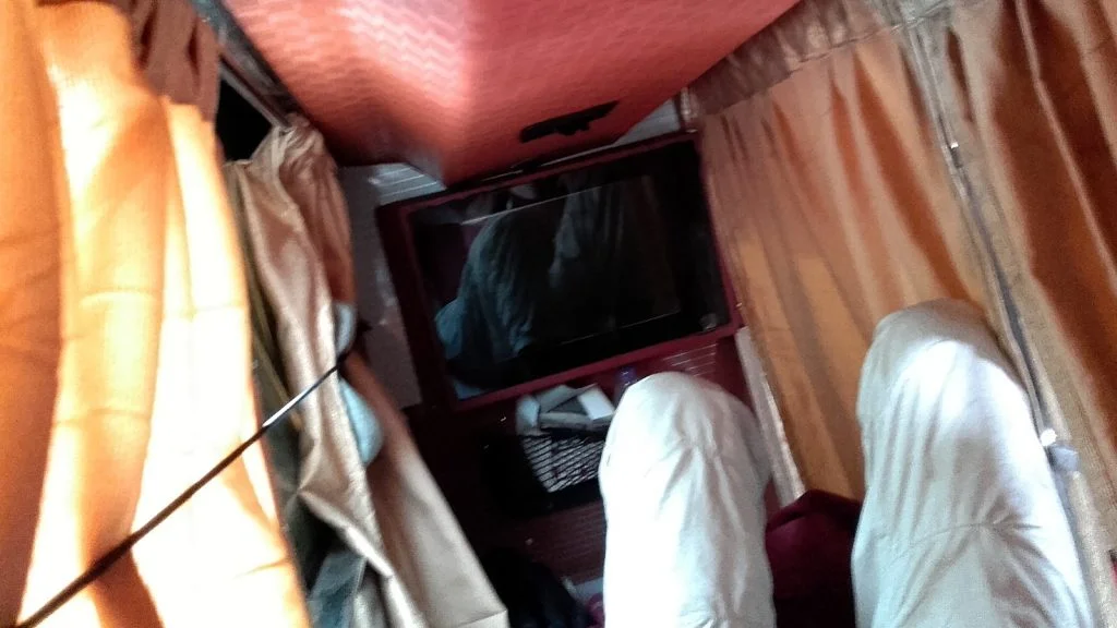 Waking up in a sleeper bus from Hampi to Mumbai.