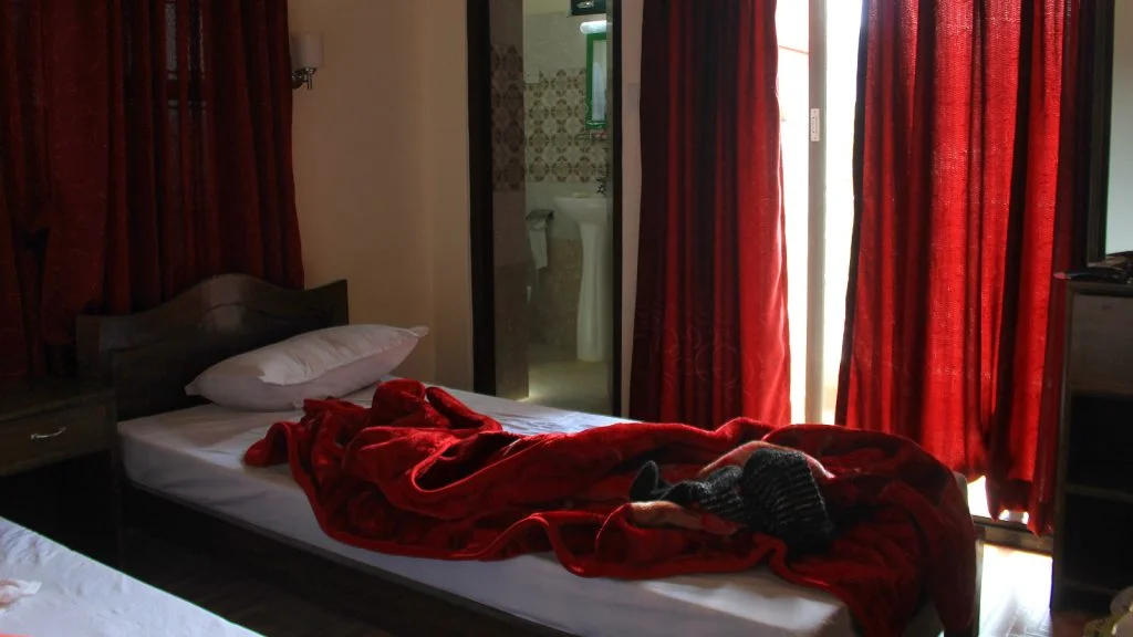 Inside a hotel room in Norday Montes Peace Home & Village guesthouse in Pokhara.