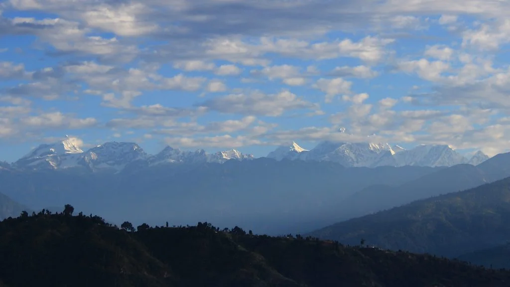Clear view of the Himalayas in Nepalese countryside.