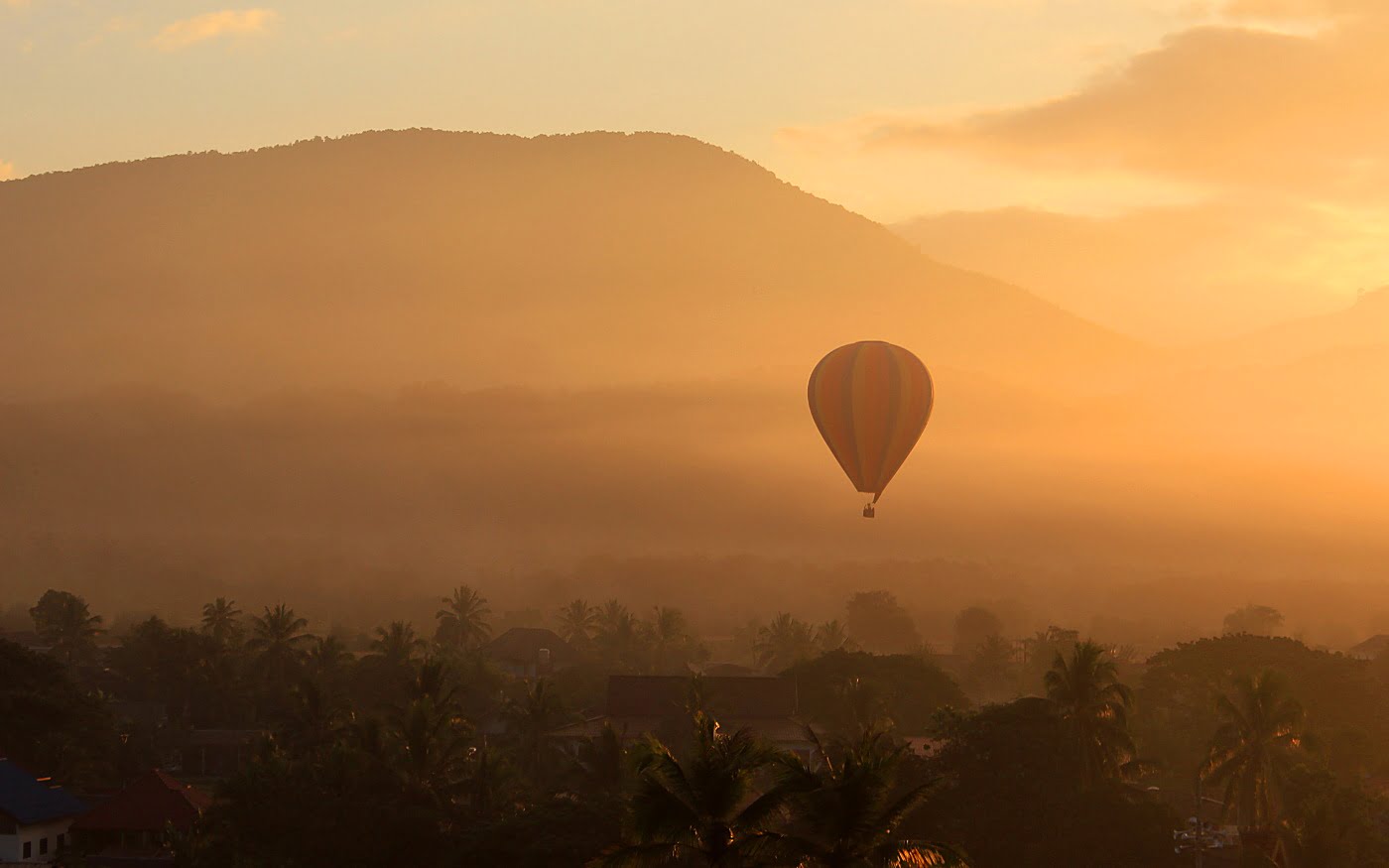 Hot air ballooning in Vang Vieng during the sunrise.