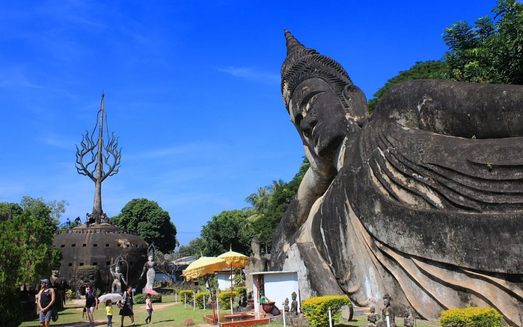 A reclining Buddha and giant pumpkin in Buddha Park (Xieng Khuan)