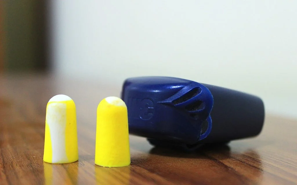 Most useful things to pack for a RTW trip. A pair of yellow earplugs.