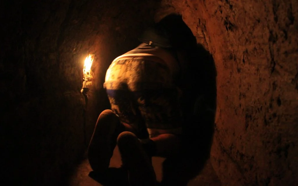Crawling inside the Cu Chi tunnels.