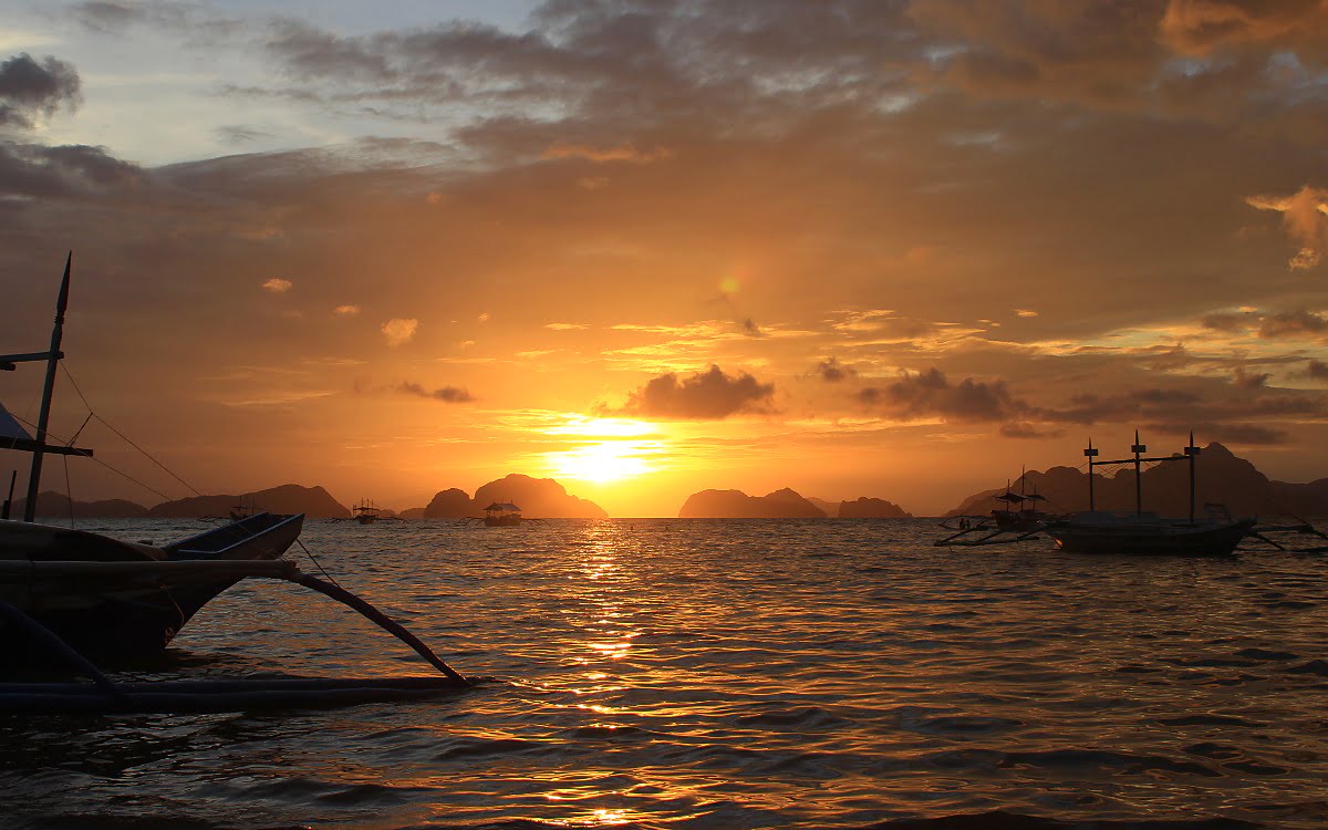 Sunset at Outpost Beach Hostel, Palawan, Philippines.