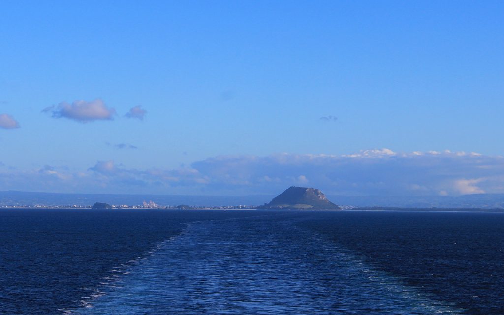 Mount Maunganui standing on the horizon.
