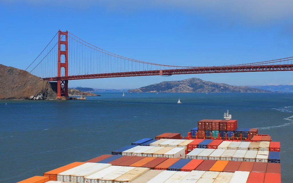 A cargo vessel ready to cross under the Golden Gate Bridge in San Francisco.