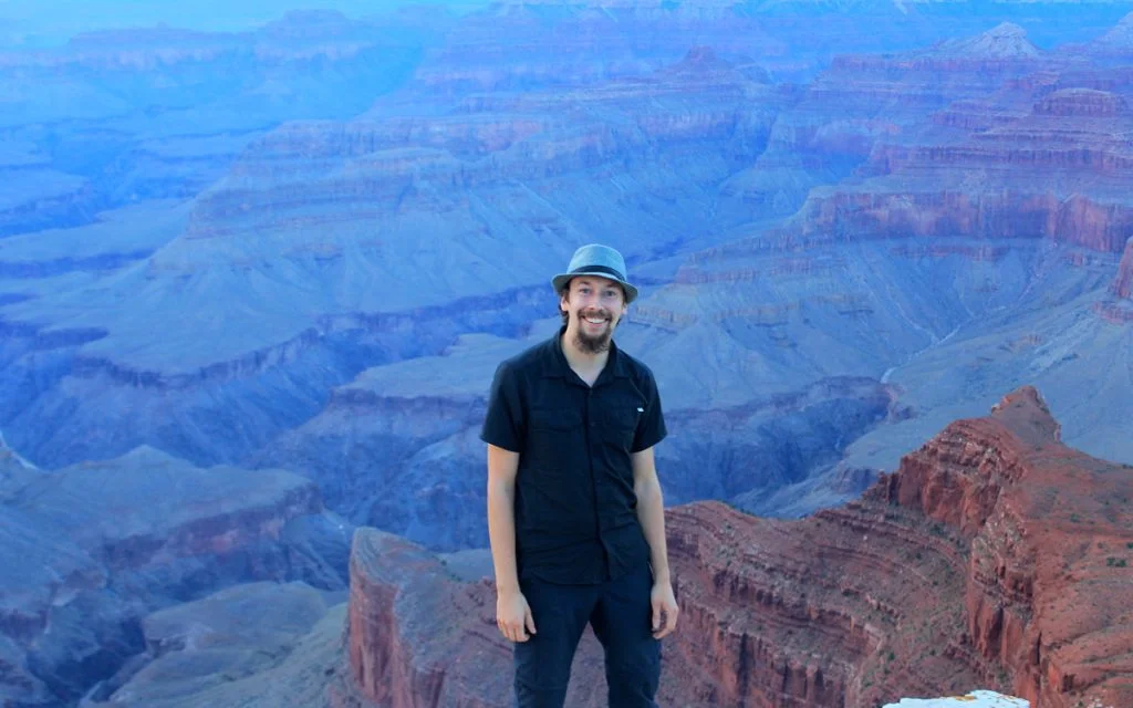 Full-time traveler Arimo Koo enjoying sunset at Grand Canyon.