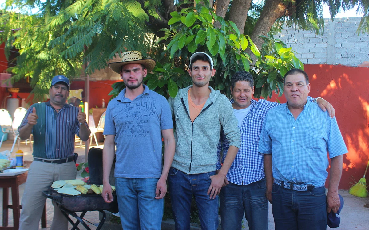 A Mexican extended family grilling.