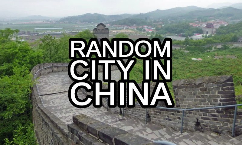Random Chinese city generator text with the Great Wall of China in the background