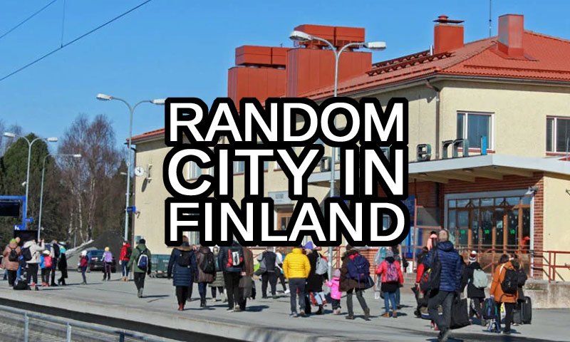 Random city in Finland text with the train station of Rovaniemi, Finland, in the background