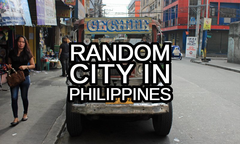 Random city in Philippines text with a jeepney in a Filipino city in the background